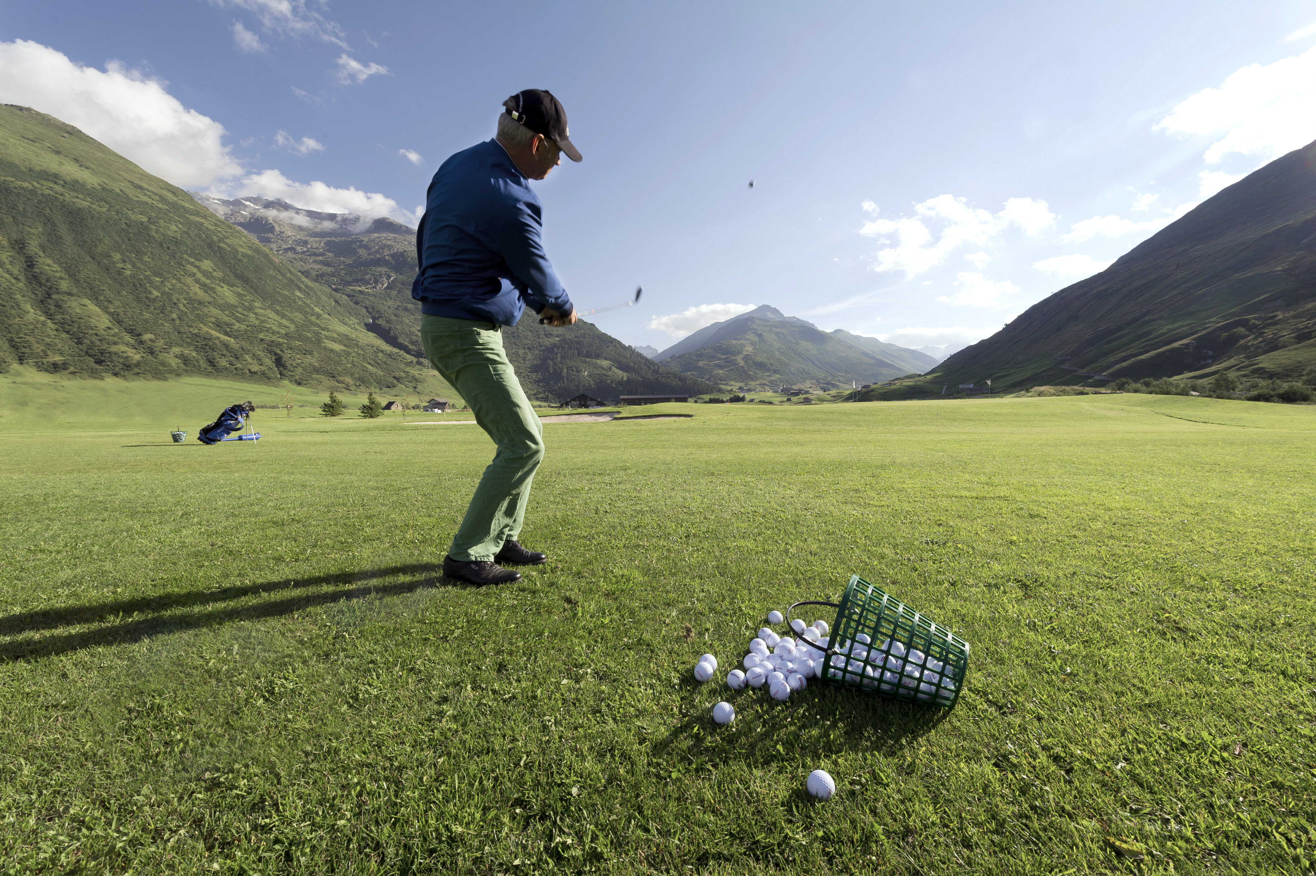 Golfer at work with practice balls